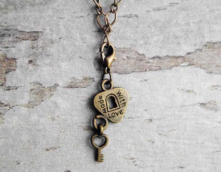 Charm "Schlüssel zum Herzen" Bronze