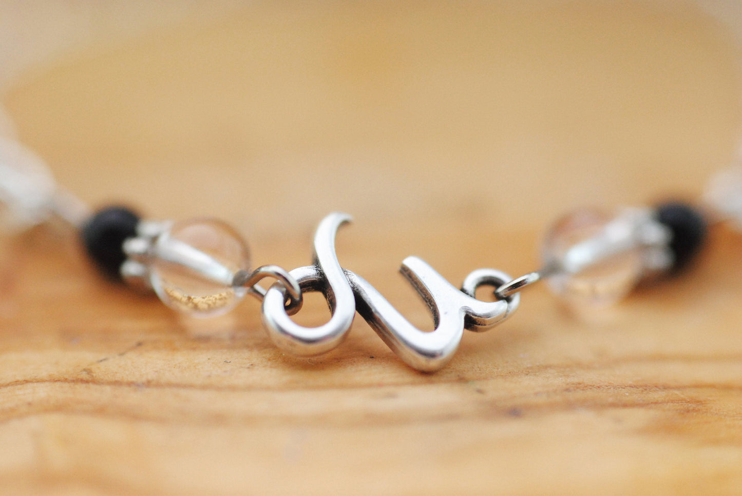 Armschmuck Steinbock versilbert mit Bergkristall und Onyx - Sternzeichen Schmuck