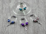 4er Set Schmuckes Glas / Sektglasmarkierer / Weinglasmarkierer / Glasmarker blau, lila, altrosé, petrolgrün