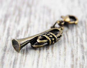 Charm "Trompete" Bronze
