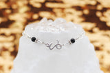 Armschmuck Steinbock versilbert mit Bergkristall und Onyx - Sternzeichen Schmuck
